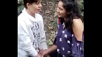 Indian girl outdoor with foreign guy