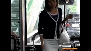 A young Asian girl enters a public bus and sits down from http://alljapanese.net