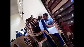 girl and boy kissing in school